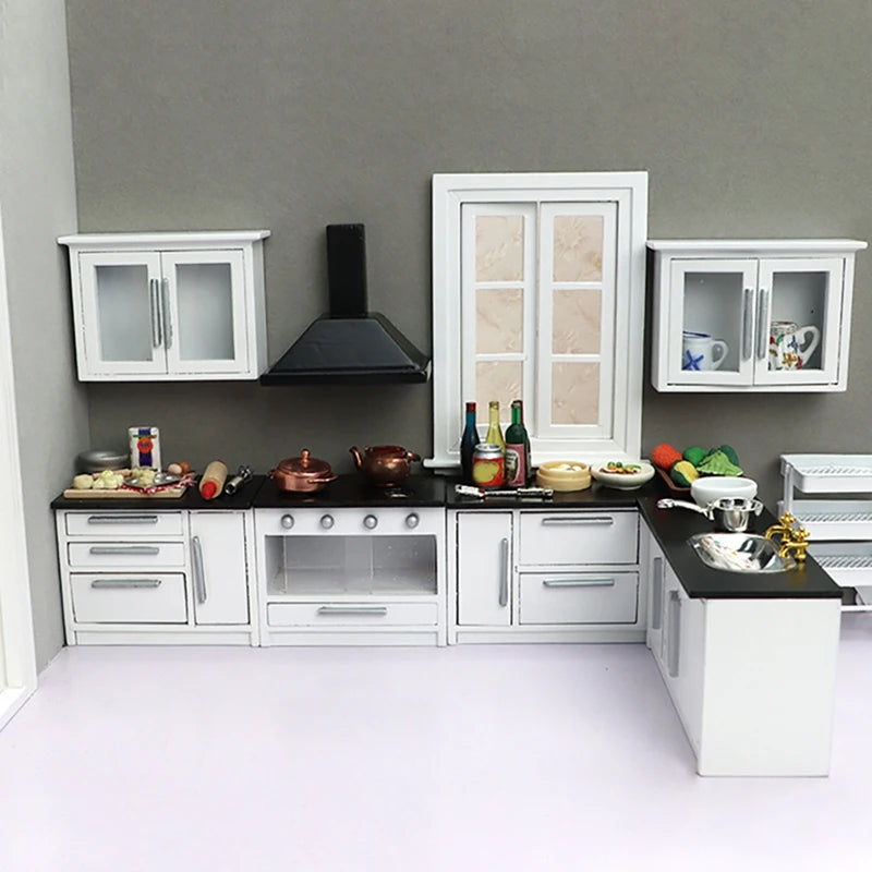 Modern 1:12 dollhouse miniature kitchen set with white cabinets, stove, and utensils; perfect for mini home decor enthusiasts.