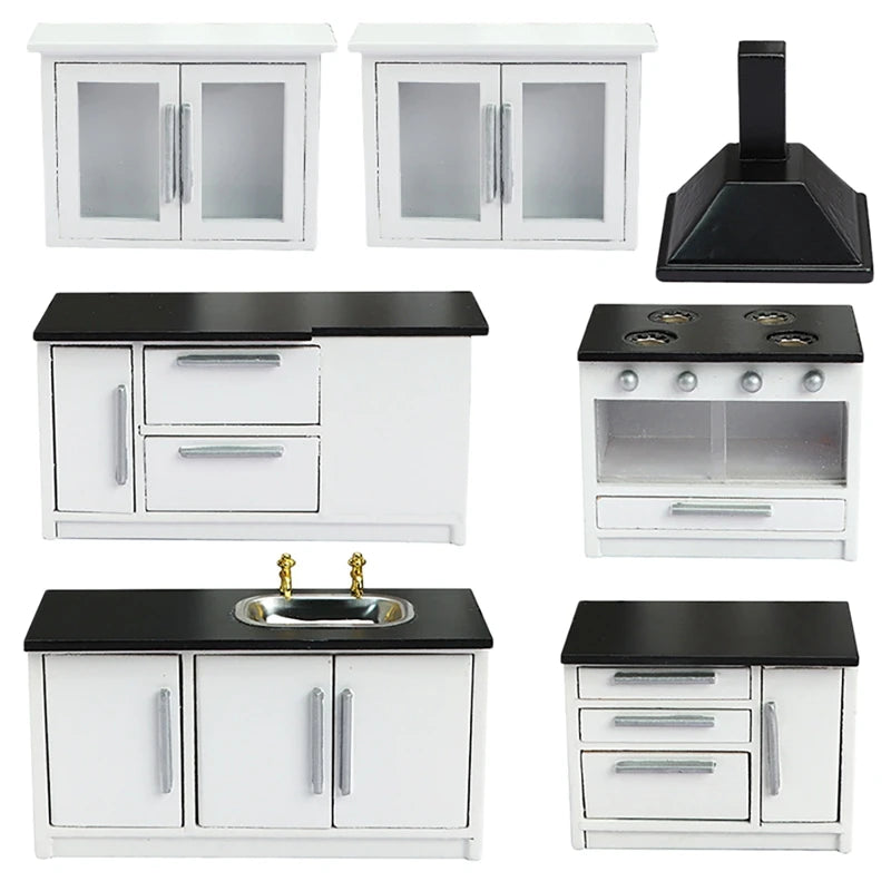 Modern 1:12 dollhouse miniature kitchen set with white cabinets, black countertops, stove, and sink for realistic play.