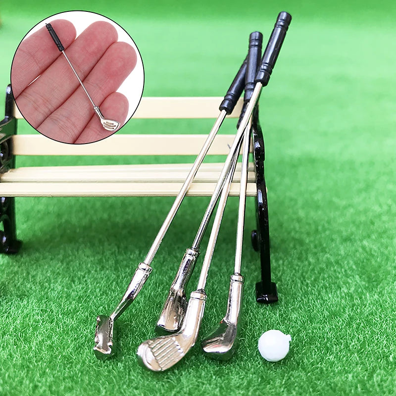 Miniature golf club set for dollhouses with four clubs and a ball on a bench, perfect for dollhouse sports scenes.