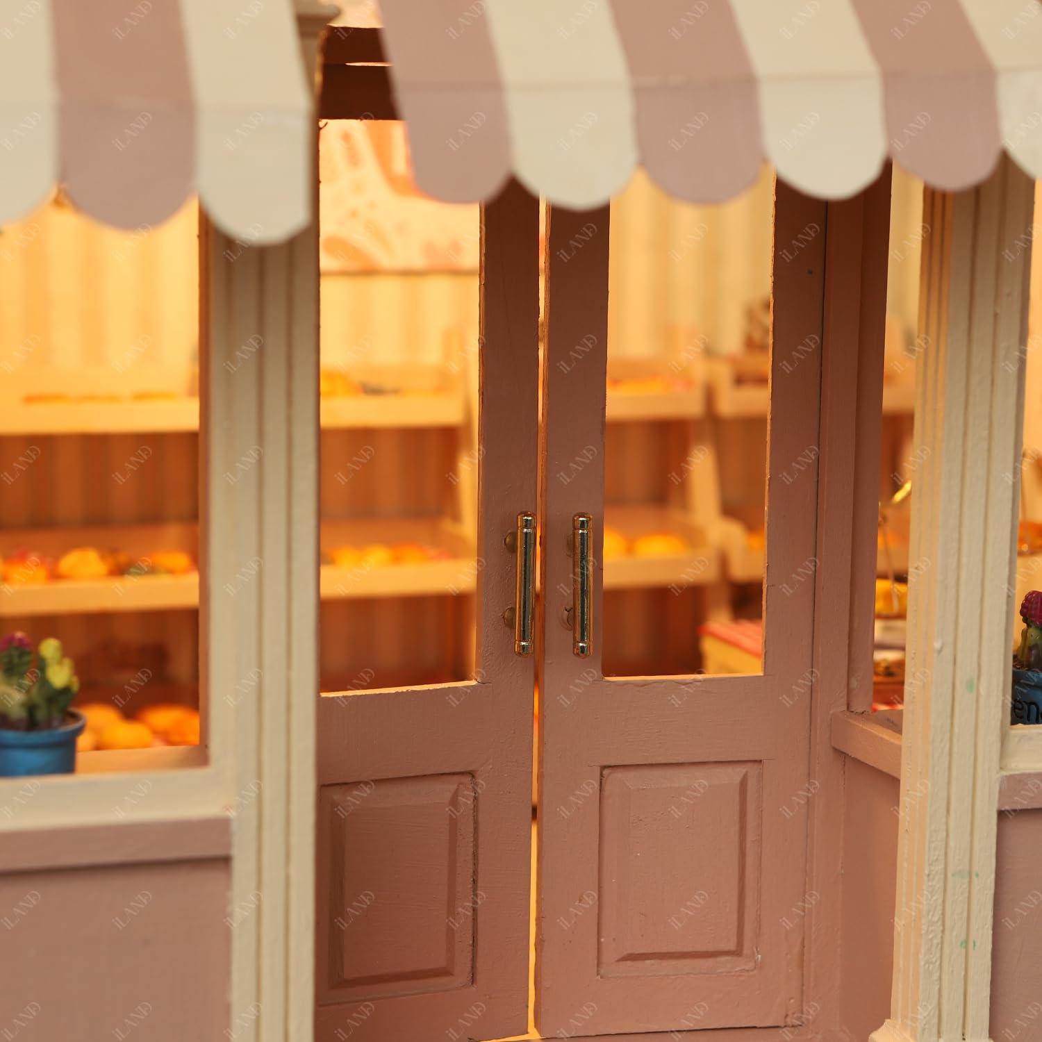 Miniature coffee shop entrance with pink double doors and striped awning on iLAND wooden dollhouse, 1/12 scale.