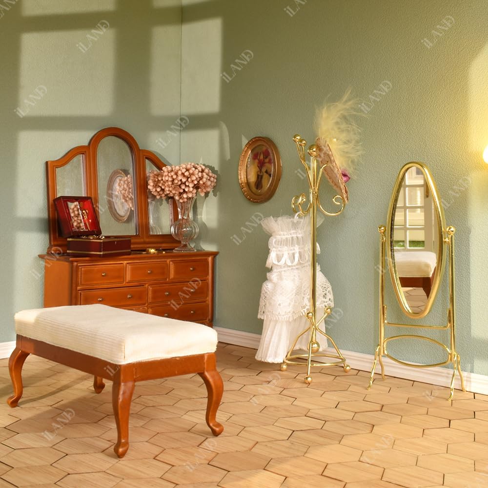 Miniature 1:12 scale dollhouse scene featuring a golden coat rack and full mirror, enhancing elegance and detail.