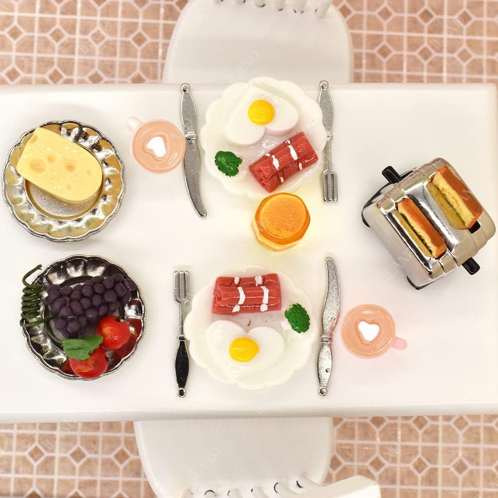 Miniature breakfast set with eggs, toast, cheese, and fruit on a dollhouse kitchen table, featuring 16 detailed pieces.