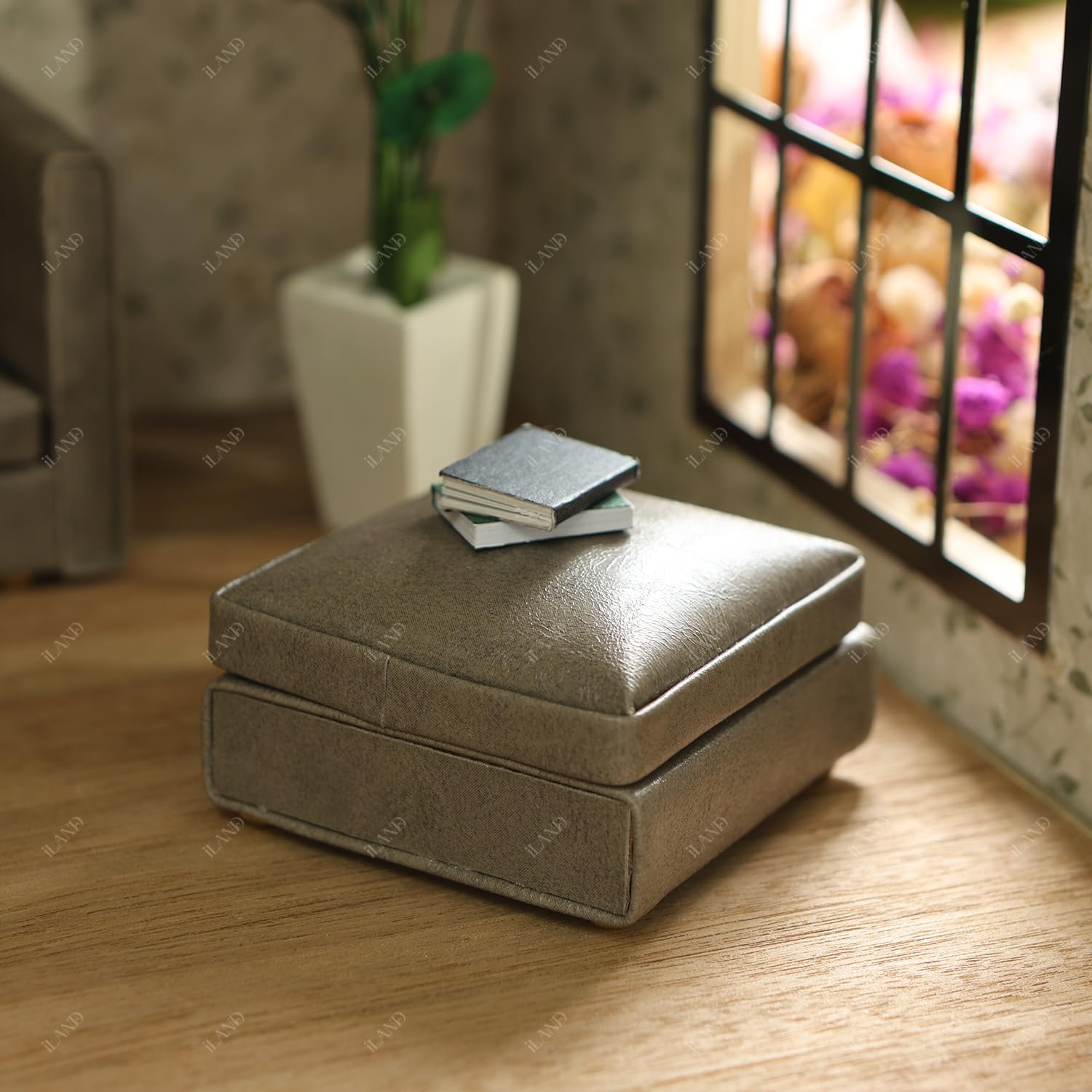 Miniature brown ottoman with books, complementing iLAND Dollhouse Furniture in 1/12 scale, perfect for dollhouse décor.