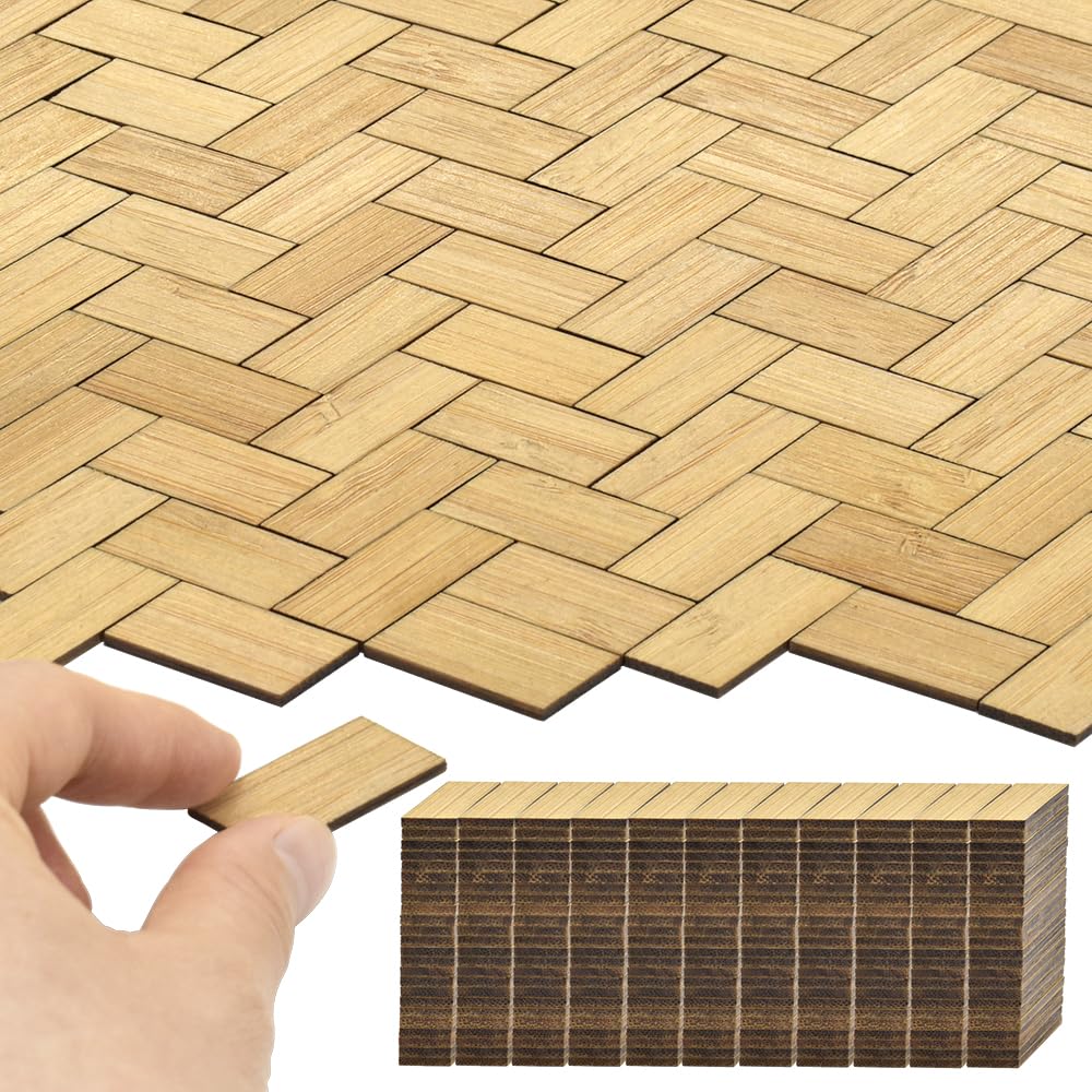 Bamboo dollhouse flooring in herringbone pattern, 1:12 scale, showing 96 varnished floorboards with hand for scale.