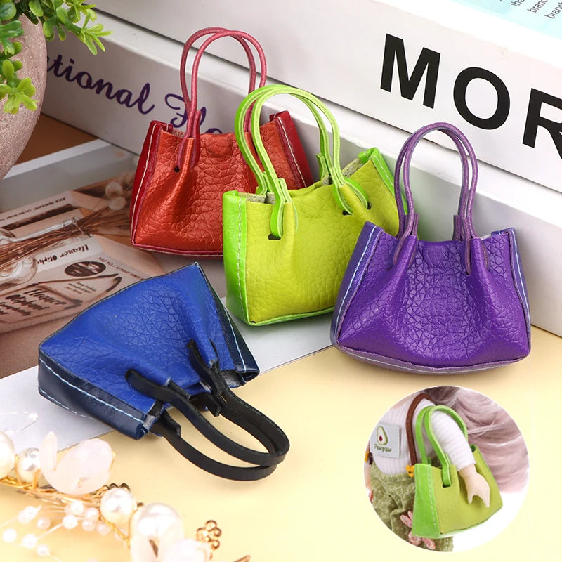 Colorful miniature dollhouse handbags in vibrant red, green, purple, and blue, perfect for doll accessories.