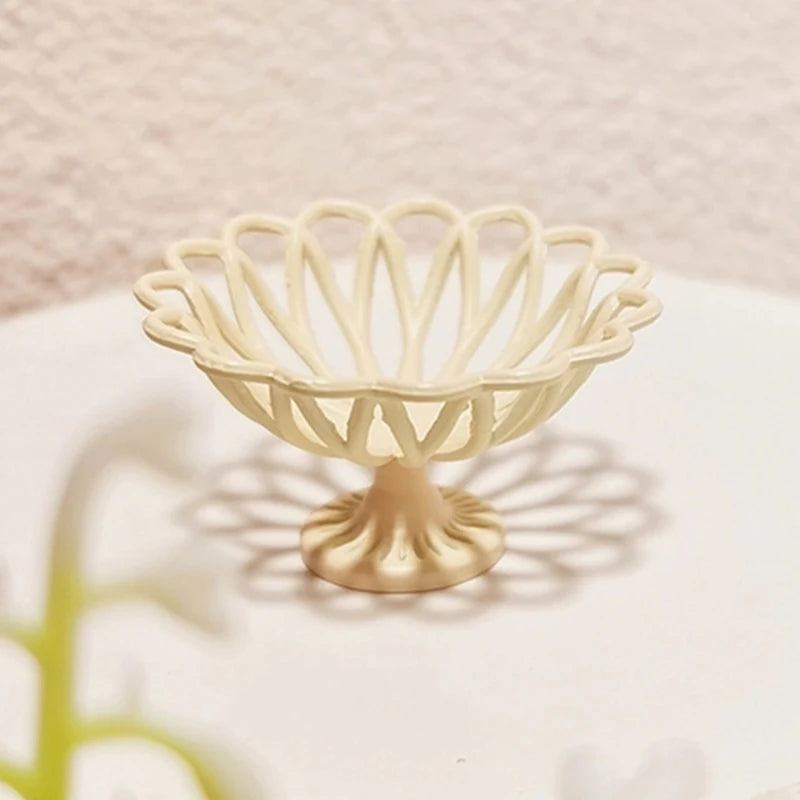 Elegant 1:12 dollhouse miniature decorative bowl, cream color with intricate openwork design, perfect for miniature settings.