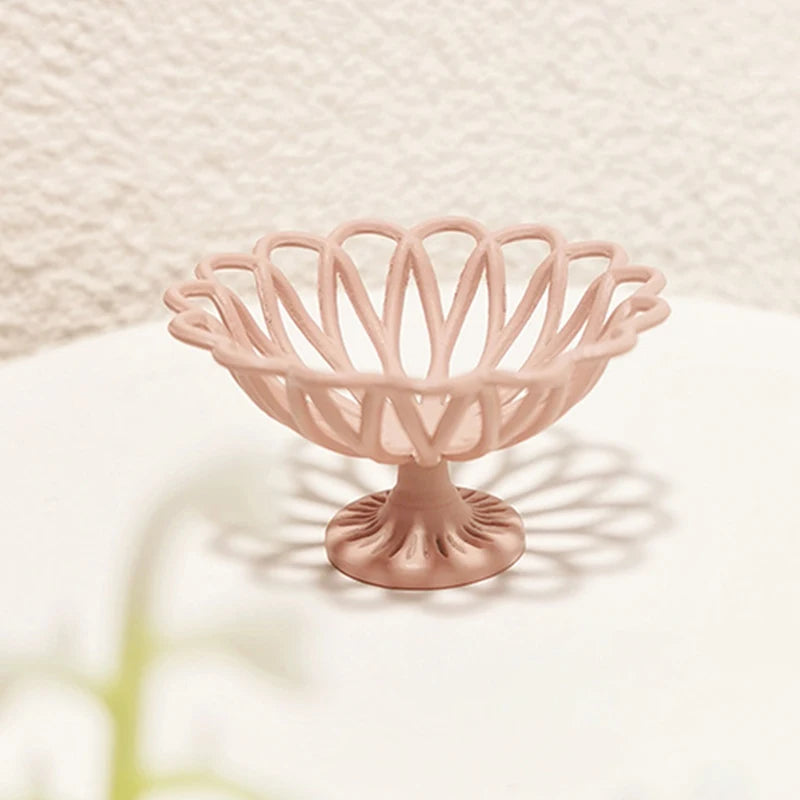 Elegant pink 1:12 dollhouse miniature decorative bowl with intricate lattice design, perfect for dollhouse décor.