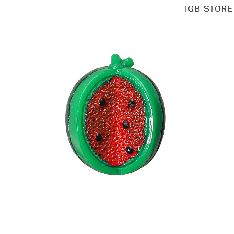 Miniature resin watermelon slice for 1:12 dollhouse, vibrant red and green design, perfect for dollhouse kitchen decor.