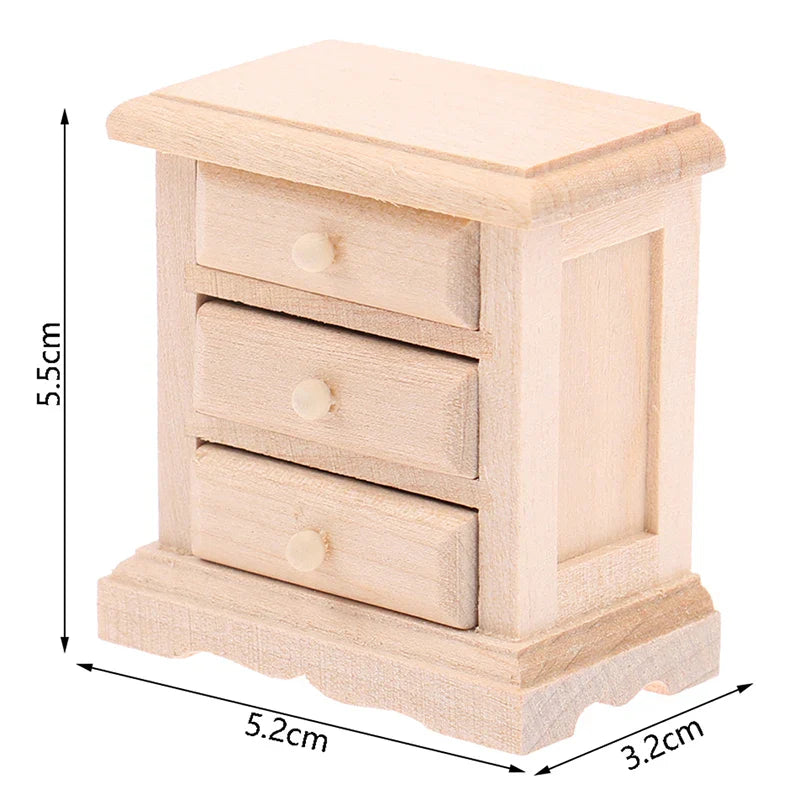Miniature wooden chest with three drawers, perfect for 1:12 scale dollhouses, measuring 5.5cm x 5.2cm x 3.2cm.