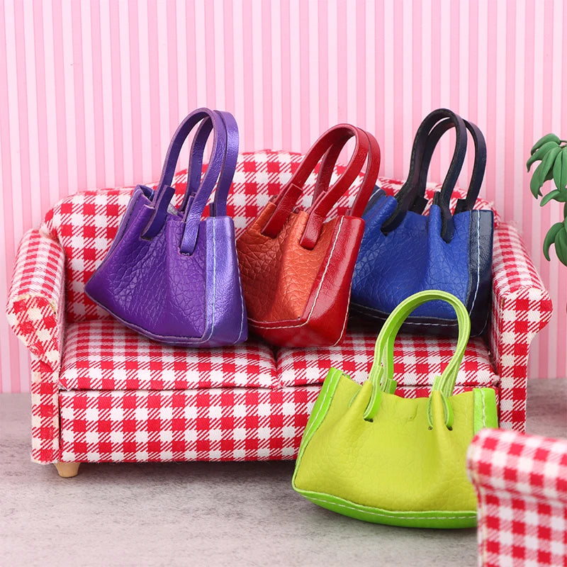 Vibrant Miniature Dollhouse Handbags on a red checkered sofa, showcasing purple, red, blue, and green designs.